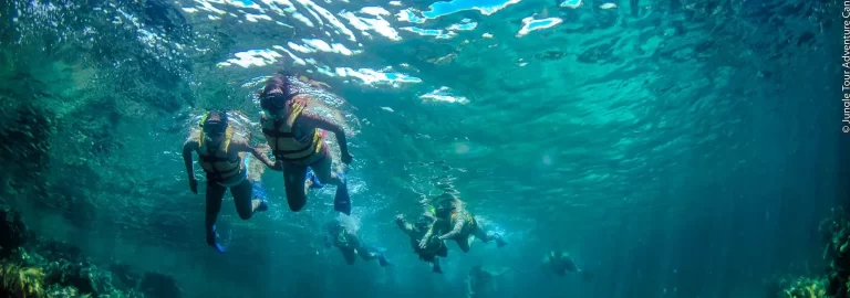People snorkeling in the reef of Punta Nizuc